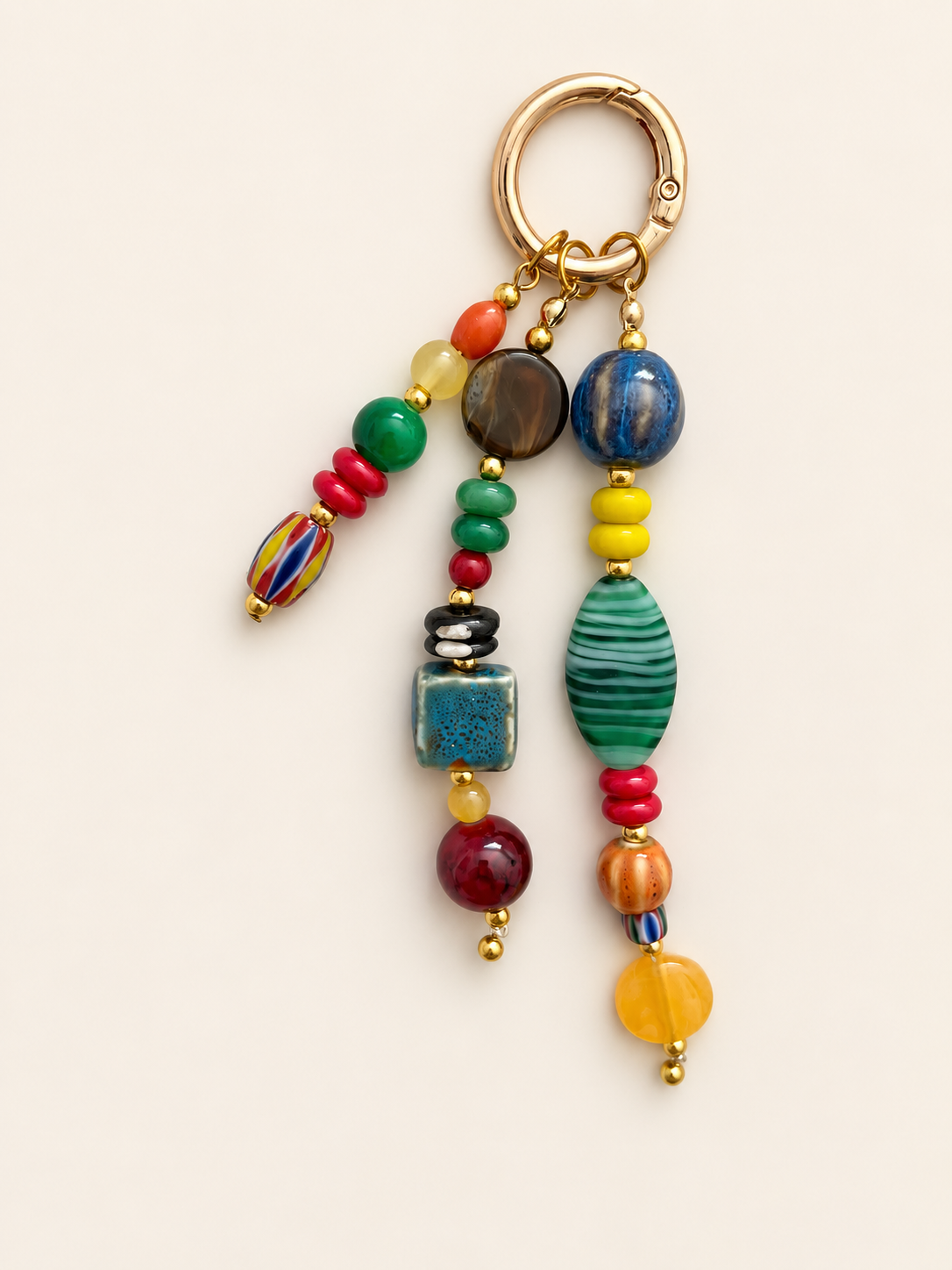 Colorful Ceramic bead bag charm with mixed glossy multicolored beads, varied shapes and gold-tone hook